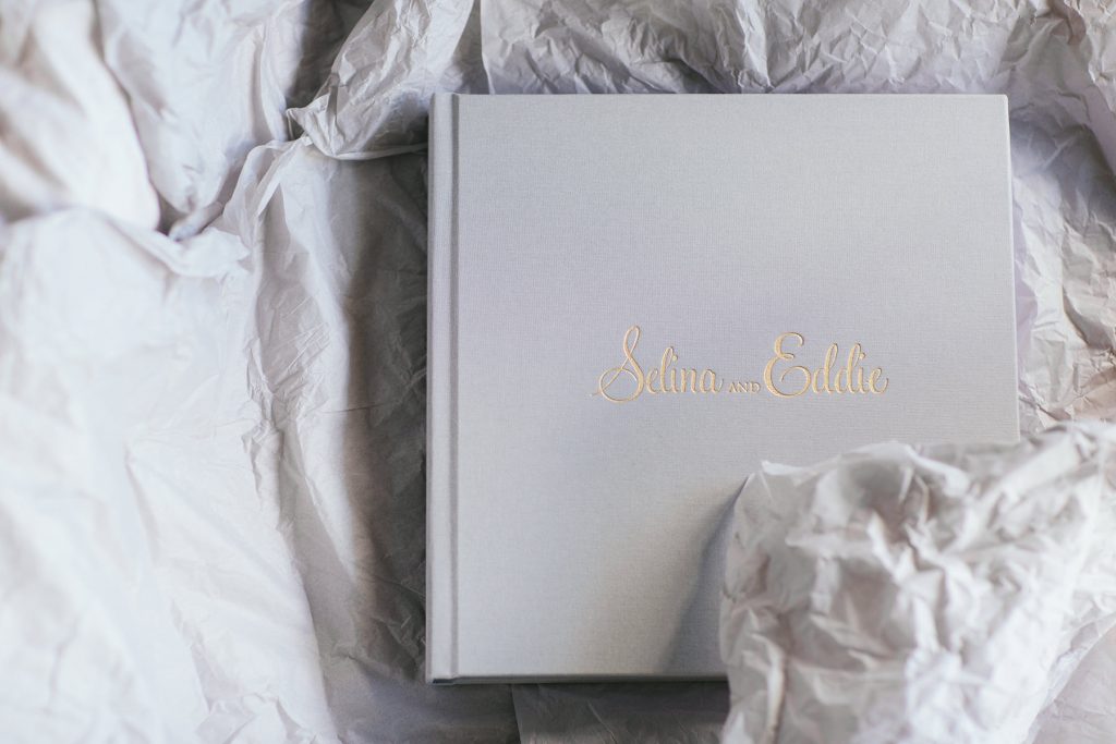 pale grey cotton cover with gold name embossing on custom vision art wedding album www.lucida-photography.com