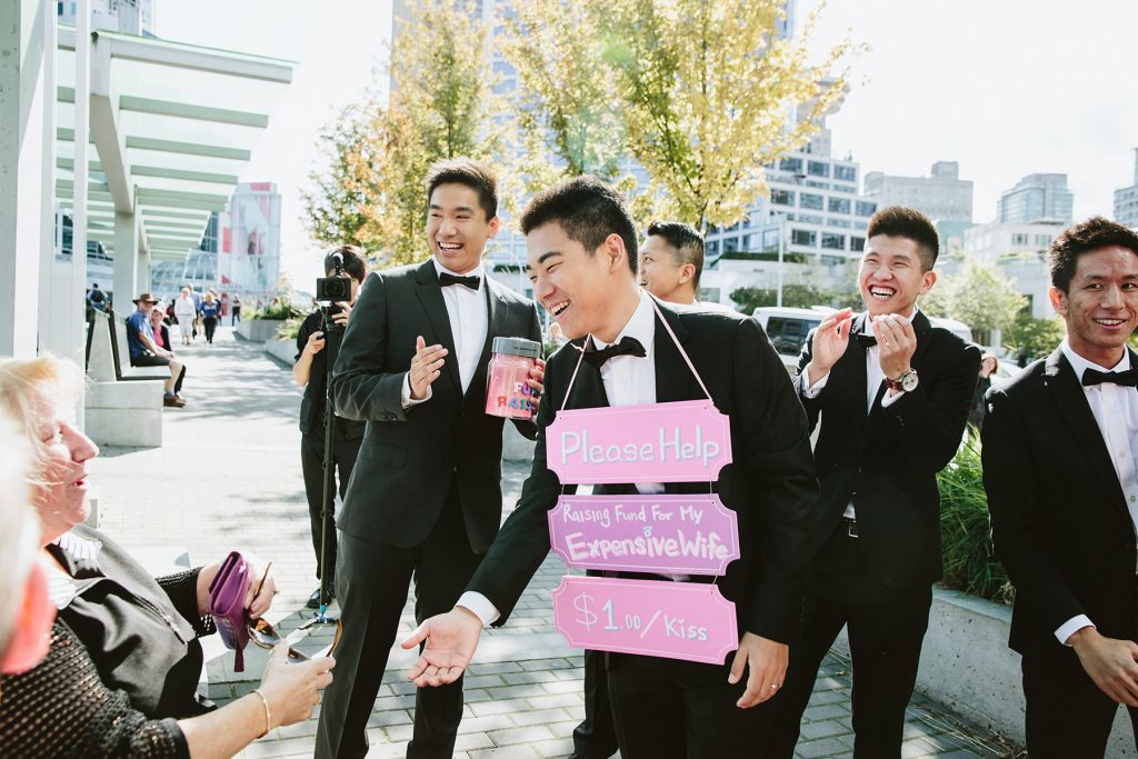 bridal party plays traditional chinese wedding games before ceremony at canada place www.lucida-photography.com
