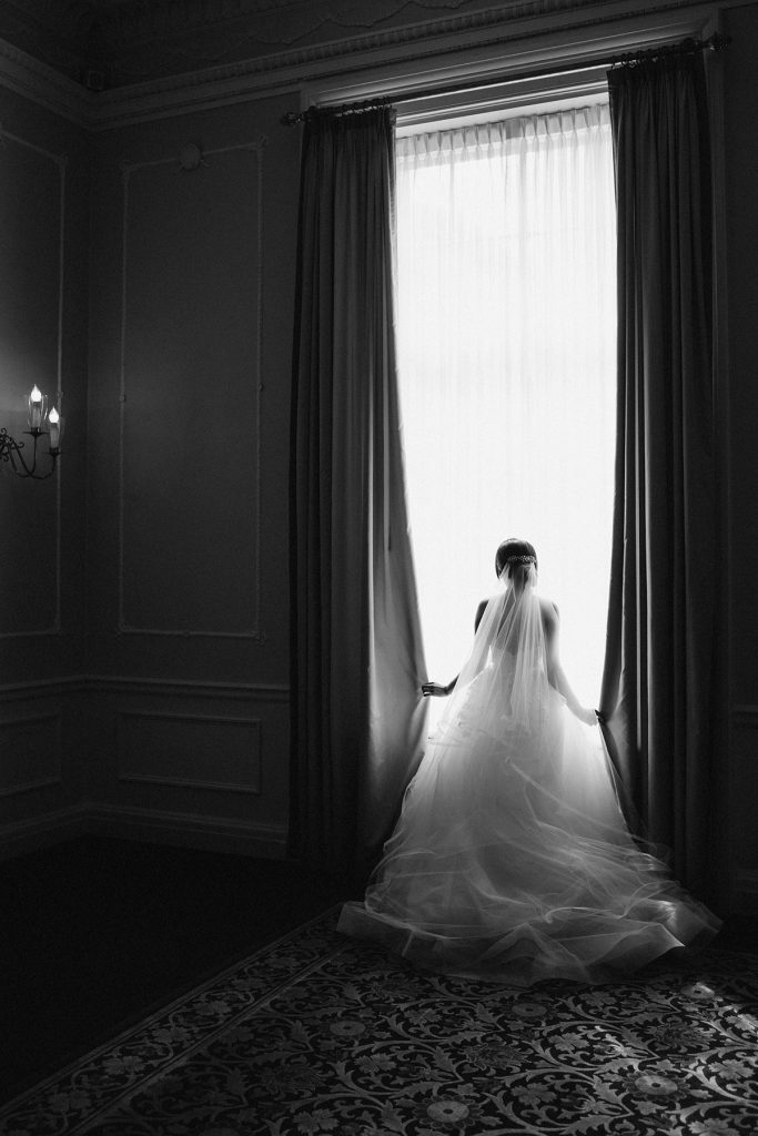 black and white photo of bride in the georgian room vancouver club www.lucida-photography.com