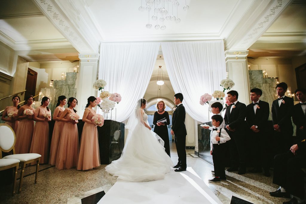 wedding ceremony in the vancouver club lobby www.lucida-photography.com