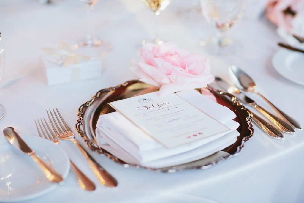 wedding place setting with silver charger and pink rose in vancouver bc www.lucida-photography.com