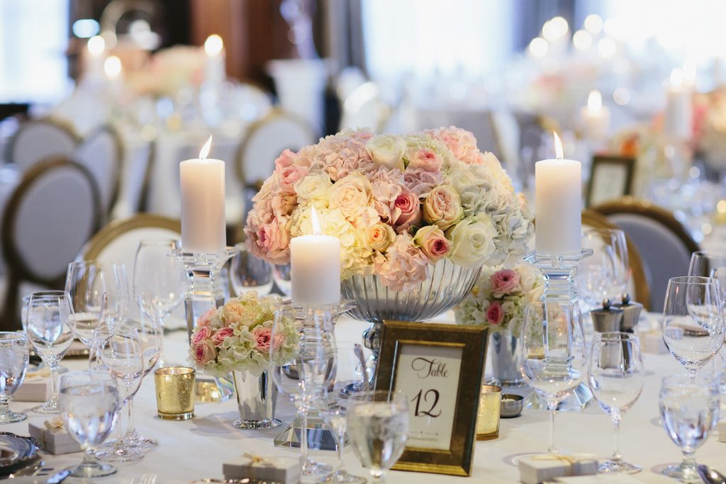 pink ivory and blush centerpieces of hydrangea rose and orchid at the vancouver club with gold louis chairs www.lucida-photography.com