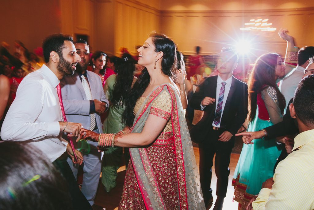 Indian bride and groom dancing at Vancouver reception www.lucida-photography.com